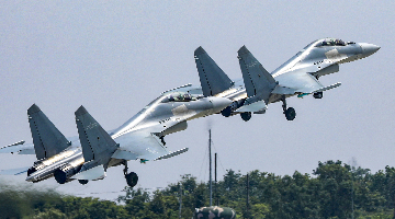 Fighter jets take off in formation during training