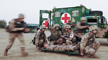Medics rescue wounded in medical support training exercise