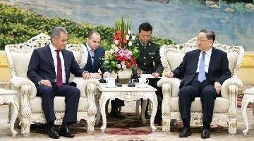 China, Russia pledge to enhance military cooperation