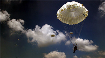 Paratroopers practice parachuting skills