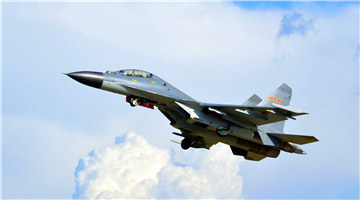J-11 fighter jets participate in round-the-clock flight training