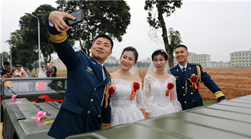 Military-style wedding: fighter jets, grooms in dashing uniforms