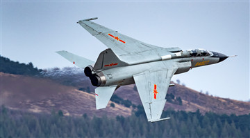 JH-7 fighter bombers soar through valley