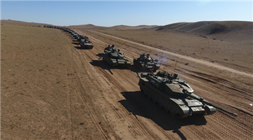 Armored army unit conducts strategic convoy maneuver