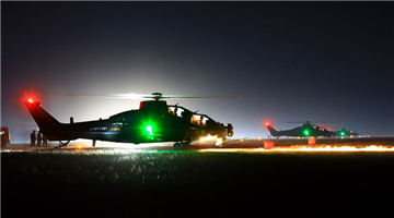 Transport helicopters lift off at sunrise