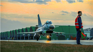 J-10 fighter jets taxi down the flightline