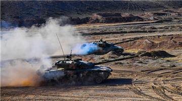 Tanks fire towards simulated enemies
