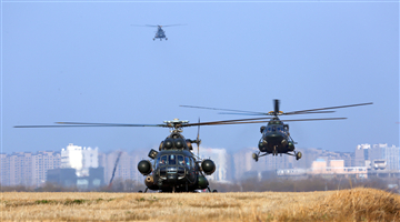 Mi-171 transport helicopters fly in formation
