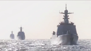 Type 055 destroyers carry out combat training